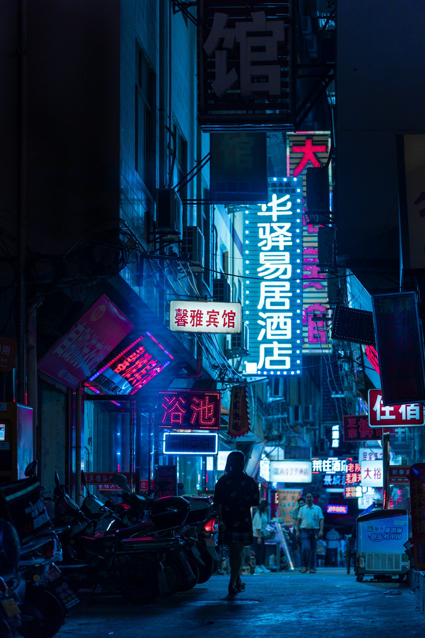 A crowded street at night
